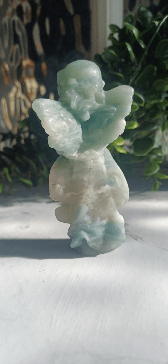 Praying Angel Carvings in Rose Quartz and Caribbean Calcite 